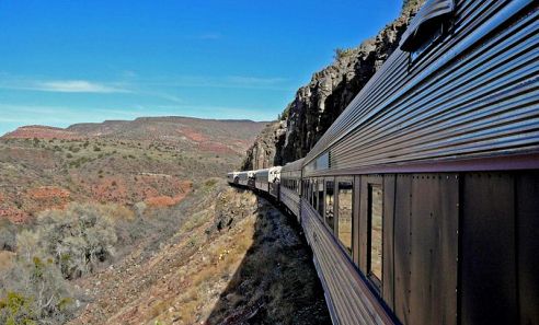 Located in the red rock country near Sedona, Verde Canyon Railroad’s rare ribbon of rails runs through a dramatic high desert landscape adjacent to a precious riparian ecosystem. Since 1912 this heritage railroad, sandwiched between two protected national